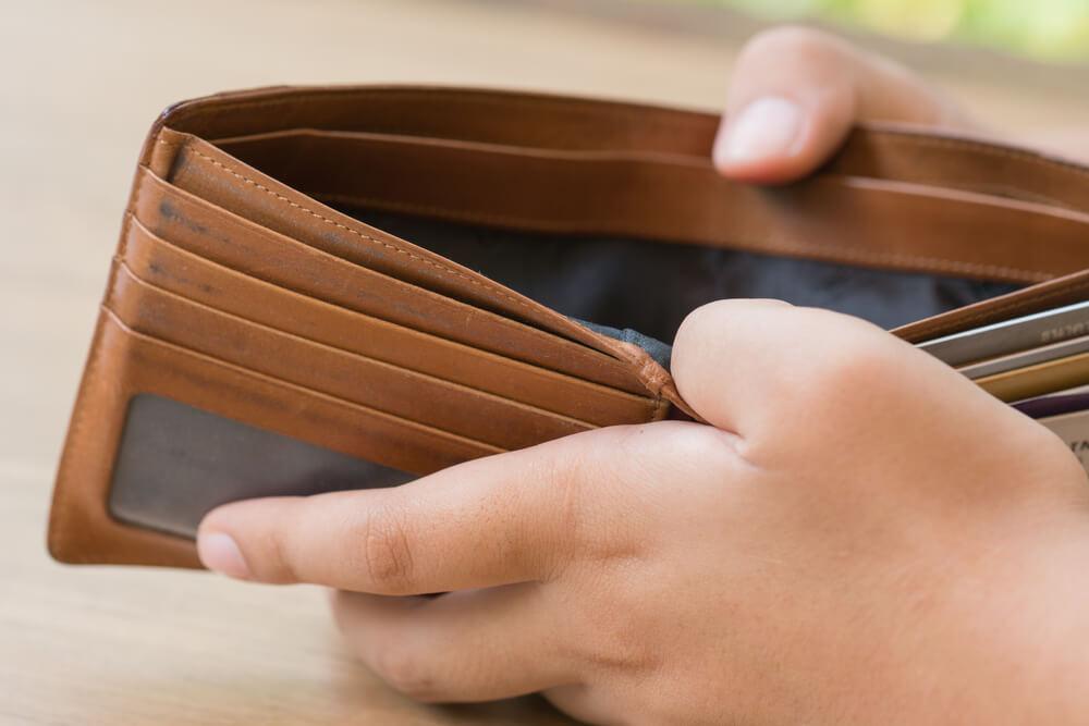 Man with an empty wallet