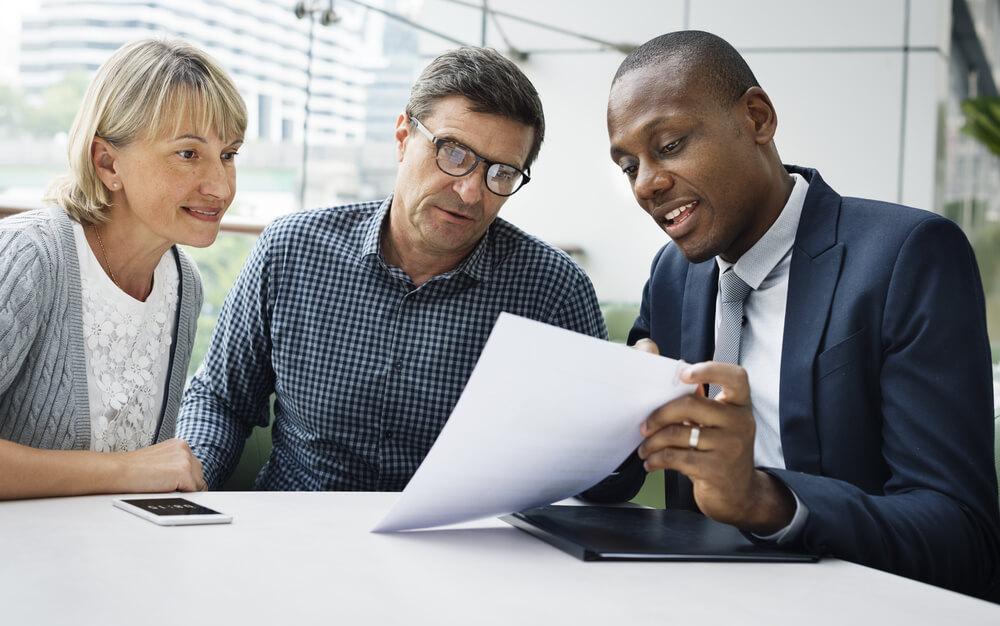 Old-couple-looking-at-retirement-plans