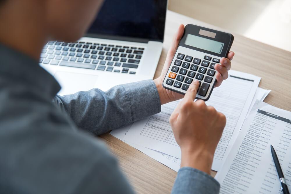 man with calculator