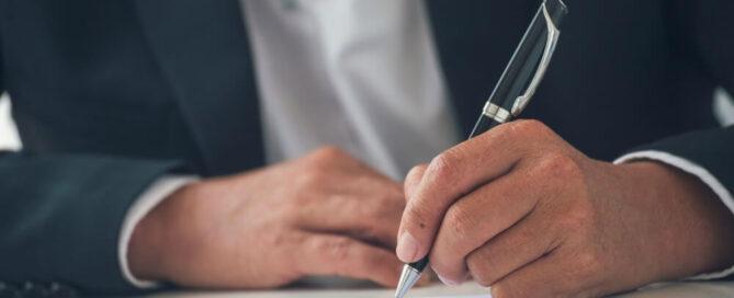 Director signing a form