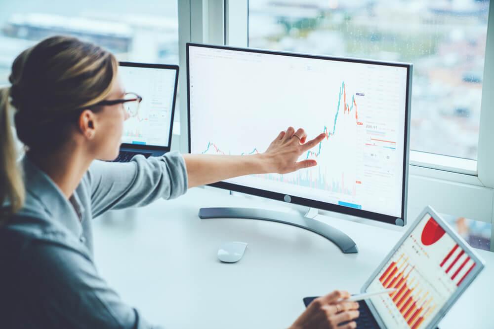 Business woman studying profits