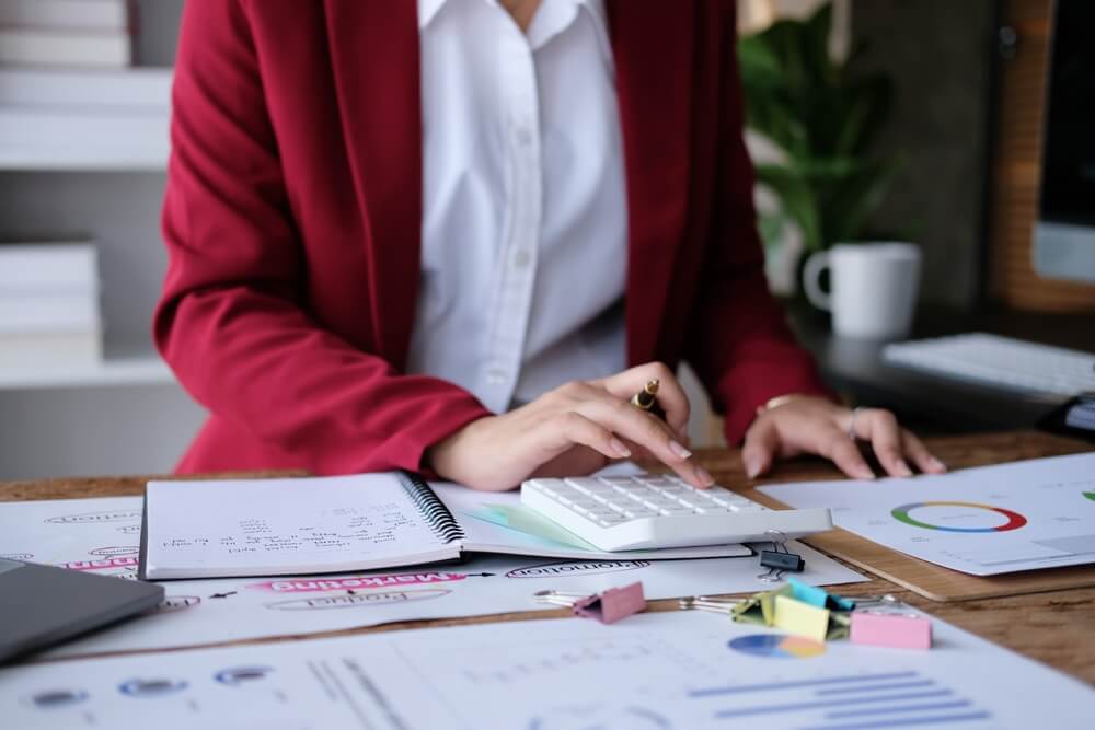 Business woman recording data