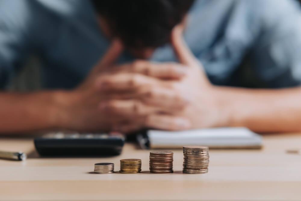 Business man losing money
