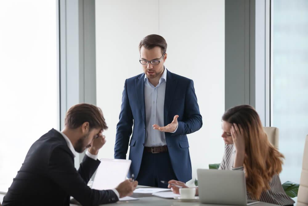 Angry Company Director talking to his colleagues